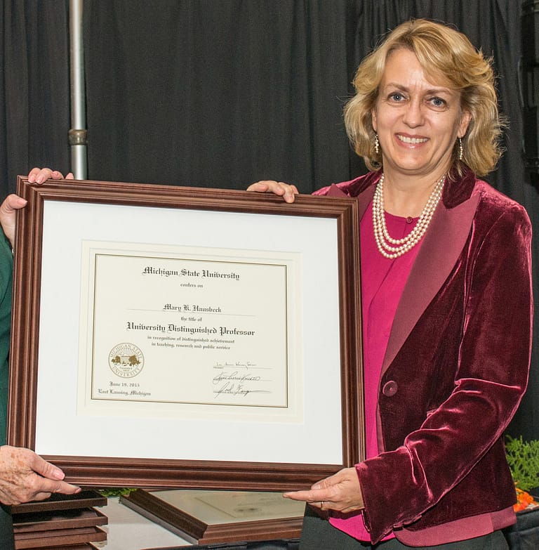 Mary Hausbeck displaying Distinguished Faculty Award